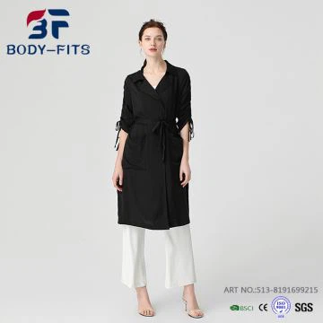 Jostas melns tranšejas mētelis sievietēm